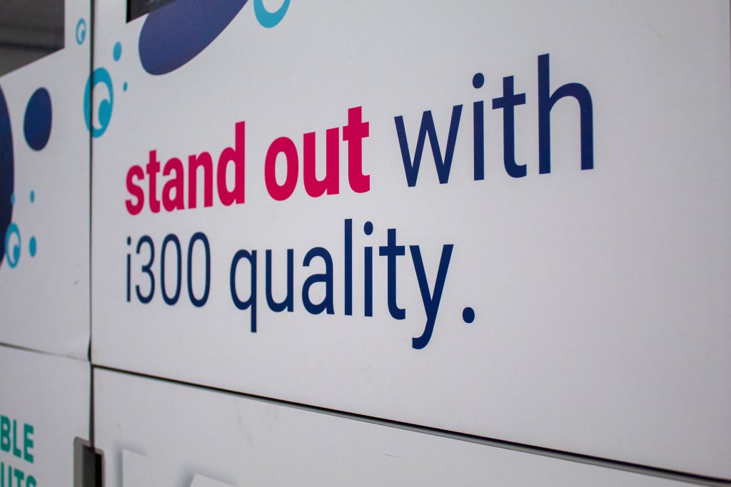 A close up photo of the i300 with the text stating "standout with i300 quality"