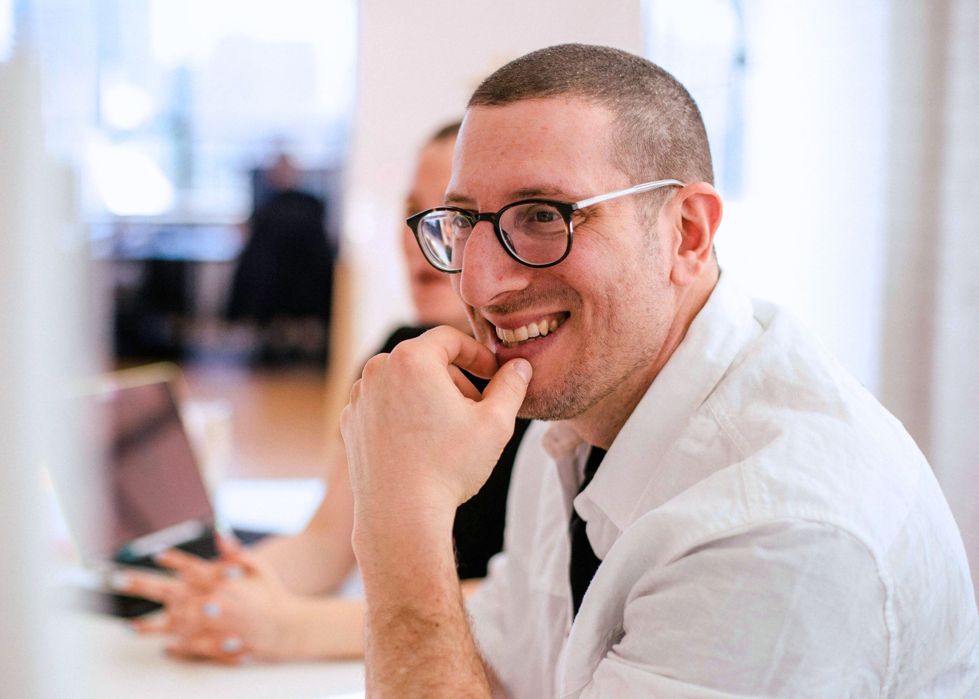 A man sitting at a office desk