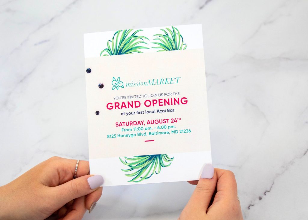 A direct mail piece announcing the grand opening of a retail location